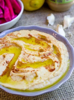 Classic Hummus made with chickpeas, tahini, garlic, olive oil and lemon juice makes the perfect appetizer or sandwich spread for your favorite meal!