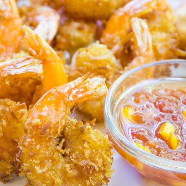 Coconut Shrimp with Sweet and Spicy Mango Habanero Dipping Sauce makes the perfect appetizer for your summer get-together and it's quick and easy!