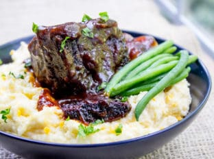Easy Braised Short Ribs are my shortcut way to enjoy crazy tender oven braised short ribs without the hour of prep they'd normally need.