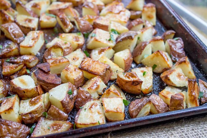 Baked red potatoes or roasted red potatoes on baking pan 