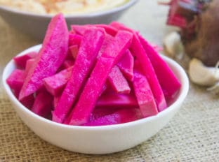 Pickled Turnips are the pickle of the Middle East, vinegary, a bit of heat and completely addicting and they are the perfect complement to your favorite gyro, falafel, roast chicken or kebab.
