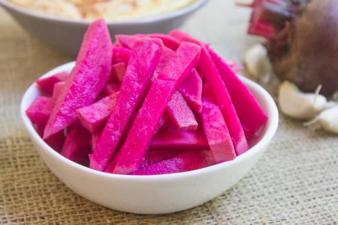 Pickled Turnips are the pickle of the Middle East, vinegary, a bit of heat and completely addicting and they are the perfect complement to your favorite gyro, falafel, roast chicken or kebab.