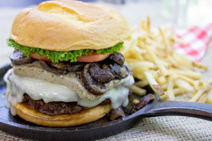 Truffle Mousse Burgers made at home with delicious truffle mousse, mushrooms and pepper crusted beef patties, this is the perfect indulgent burger for your summer cookout, graduation or Father's Day.