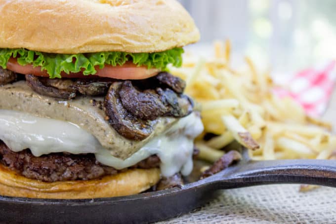 Truffle Mousse Burgers made at home with delicious truffle mousse, mushrooms and pepper crusted beef patties, this is the perfect indulgent burger for your summer cookout, graduation or Father's Day.