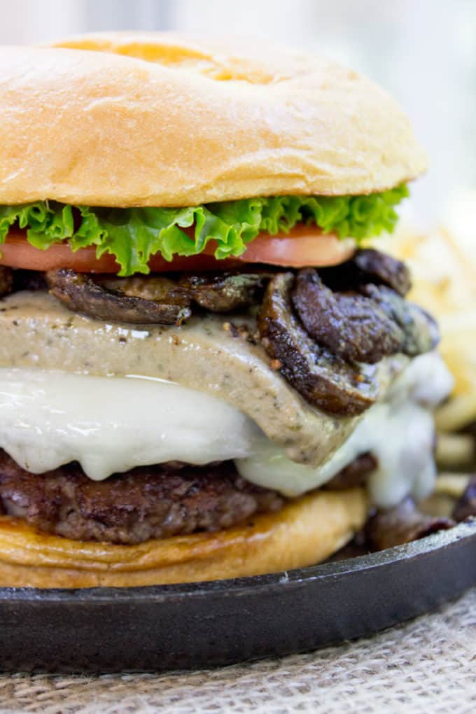 Truffle Mousse Burgers made at home with delicious truffle mousse, mushrooms and pepper crusted beef patties, this is the perfect indulgent burger for your summer cookout, graduation or Father's Day.