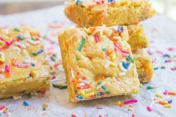Cake Batter Blondies with all the flavors of your favorite birthday cake without the cake mix! Full of sprinkle goodness, chewy and soft!