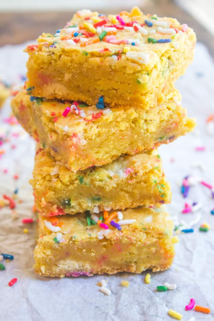 Cake Batter Blondies with all the flavors of your favorite birthday cake without the cake mix! Full of sprinkle goodness, chewy and soft!