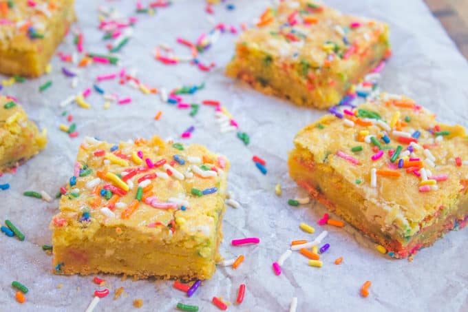 Cake Batter Blondies with all the flavors of your favorite birthday cake without the cake mix! Full of sprinkle goodness, chewy and soft!