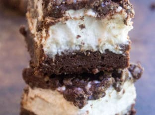 Marshmallow Crunch Brownie Bars are a totally indulgent brownie with three kinds of chocolate, an awesome marshmallow layer and the best brownie base.
