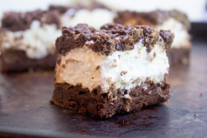 Marshmallow Crunch Brownie Bars are a totally indulgent brownie with three kinds of chocolate, an awesome marshmallow layer and the best brownie base. 