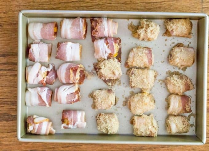 Bacon Wrapped Tater Tot Bombs are an easy appetizer of tater tots and sharp cheddar cheese wrapped in thick cut bacon, rolled in brown sugar and baked.