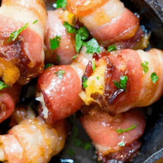 bacon wrapped tater tots with cheese piled up