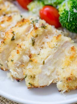 Crispy Baked Lemon Parmesan Chicken with fresh lemon, butter, garlic and Parmesan has all the flavors of your favorite scampi dish but in a healthier oven baked version.
