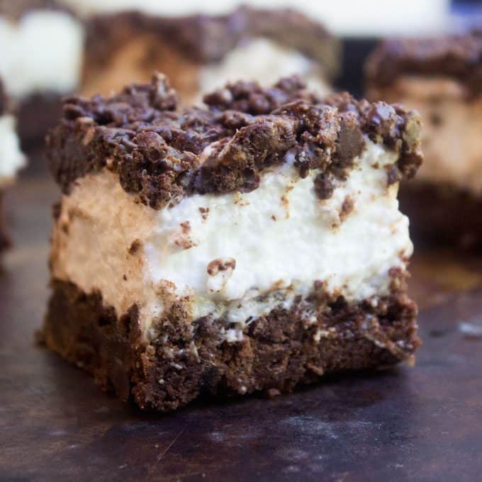 Marshmallow Crunch Brownie Bars are a totally indulgent brownie with three kinds of chocolate, an awesome marshmallow layer and the best brownie base. 