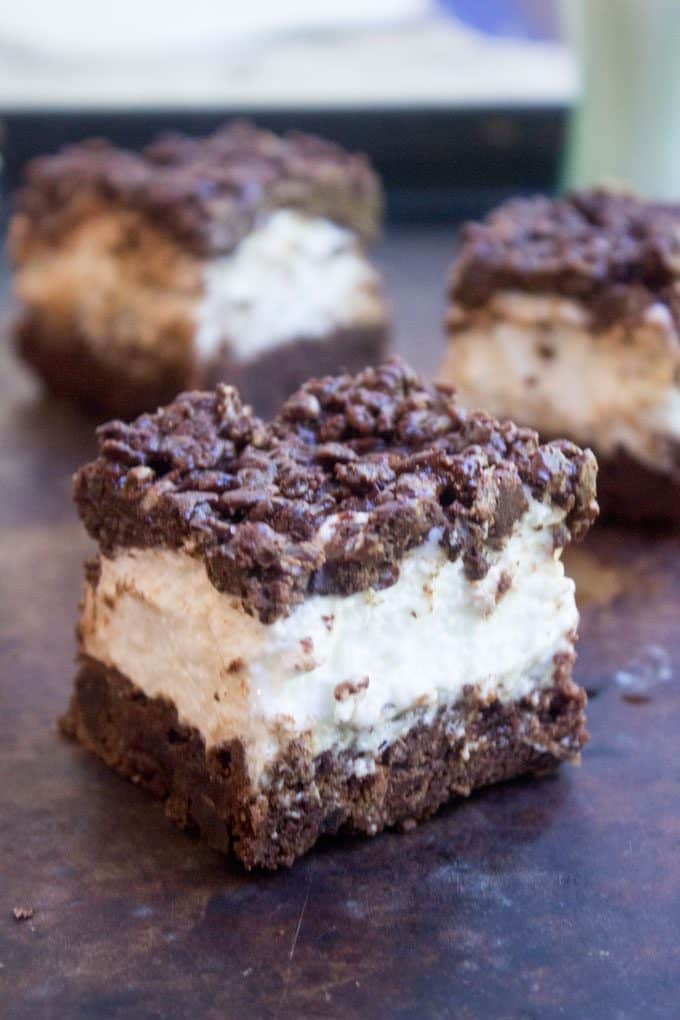 Marshmallow Crunch Brownie Bars are a totally indulgent brownie with three kinds of chocolate, an awesome marshmallow layer and the best brownie base. 