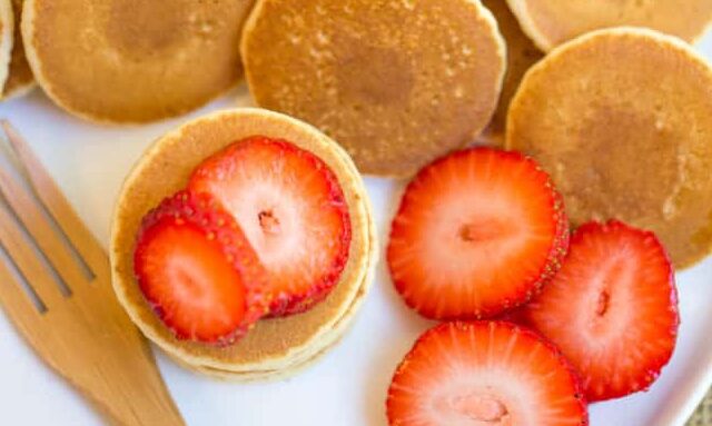 Mini Pancakes with fork and strawberries
