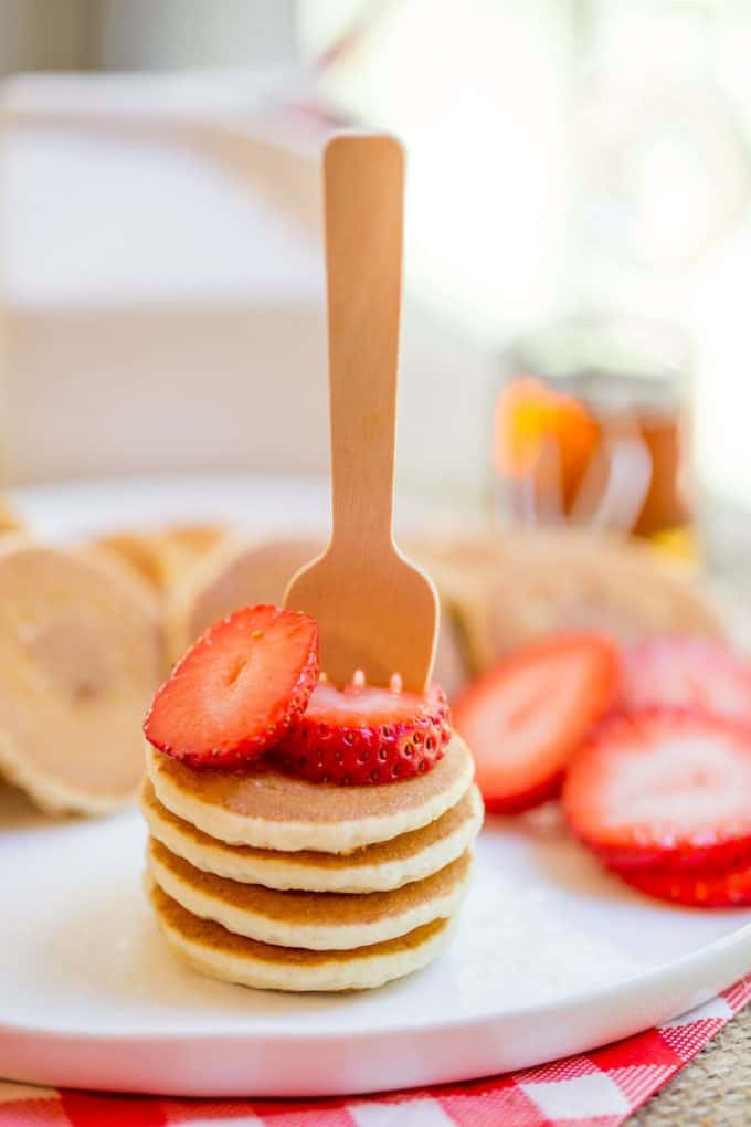 Mini Pancakes, sometimes called Silver Dollar are the easiest quickest little pancake bites that are perfect for parties, brunches, kids and pancake kabobs! dinnerthendessert.com