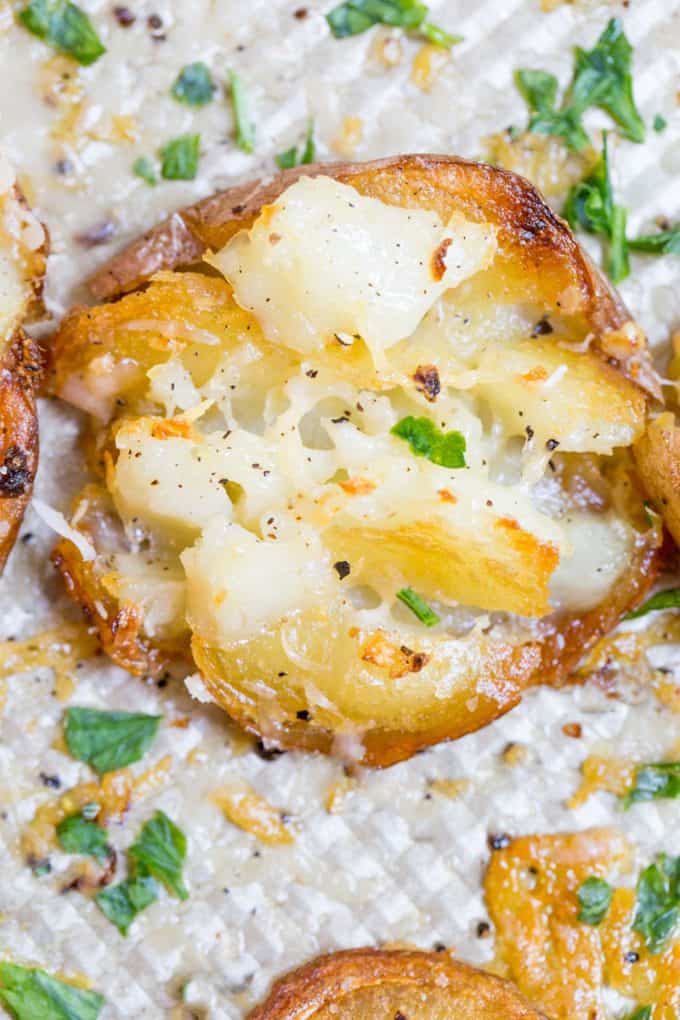 Parmesan Garlic Crash Hot Potatoes are crispy, creamy, cheesy and garlicky. Made in one pan and no boiling necessary, they're the perfect holiday side dish.