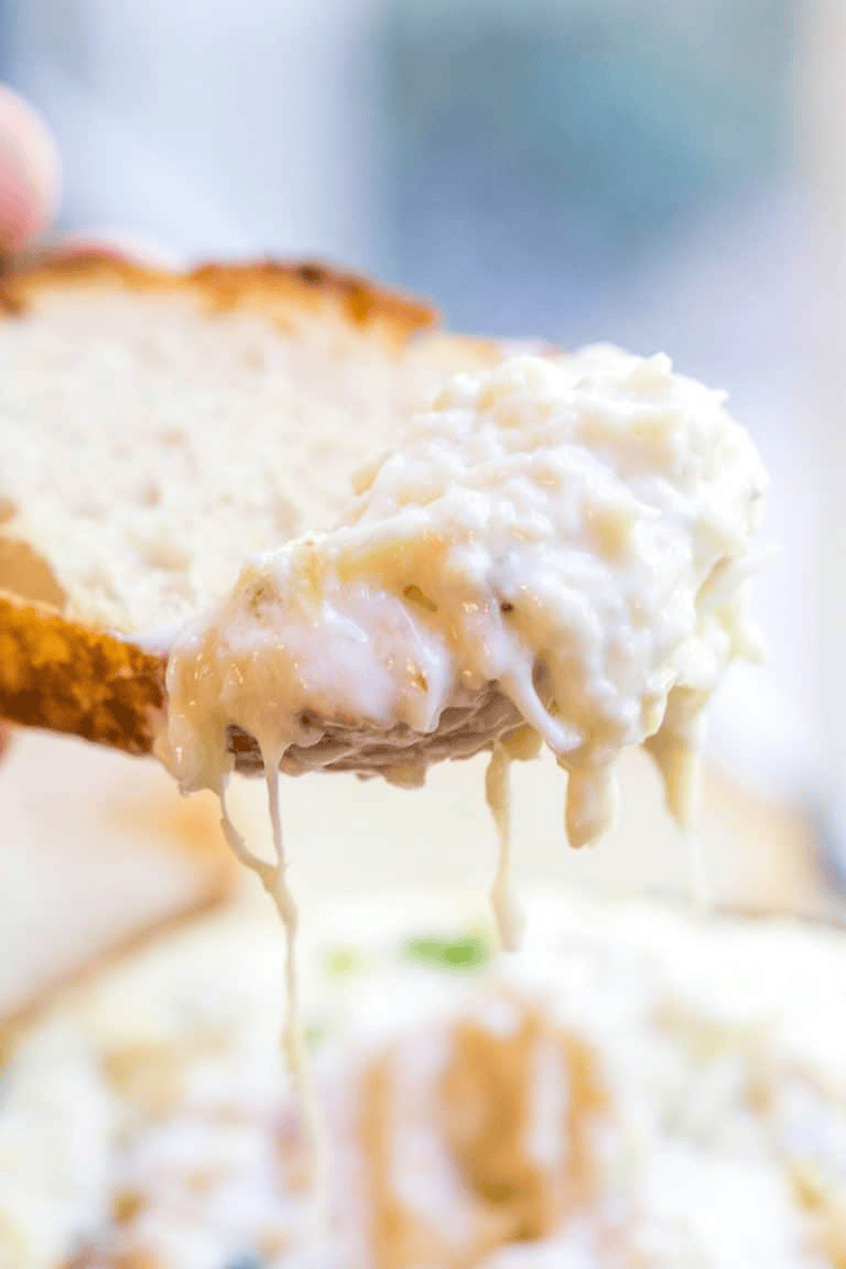Bread slice with cheesy dip