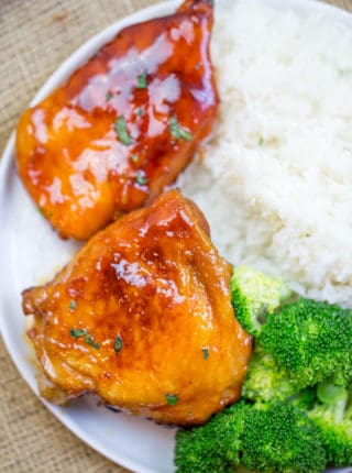 Baked Fire Popper Chicken is made with chicken breasts baked in a glorious honey-brown sugar hot sauce until they're sticky, sweet, spicy perfection!