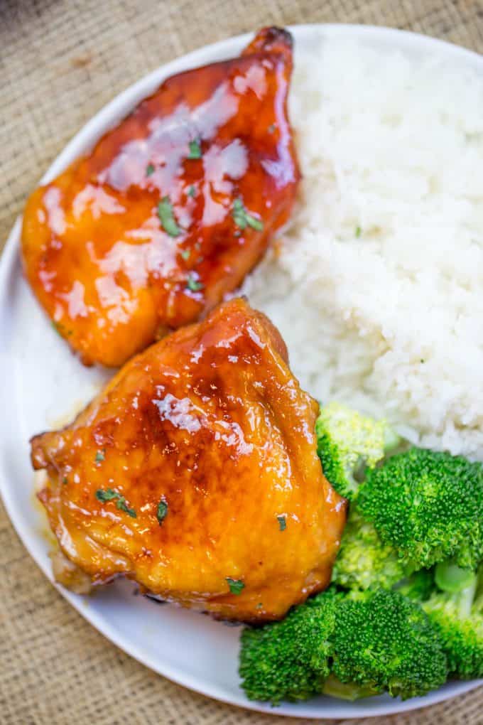 Baked Fire Popper Chicken is made with chicken breasts baked in a glorious honey-brown sugar hot sauce until they're sticky, sweet, spicy perfection!