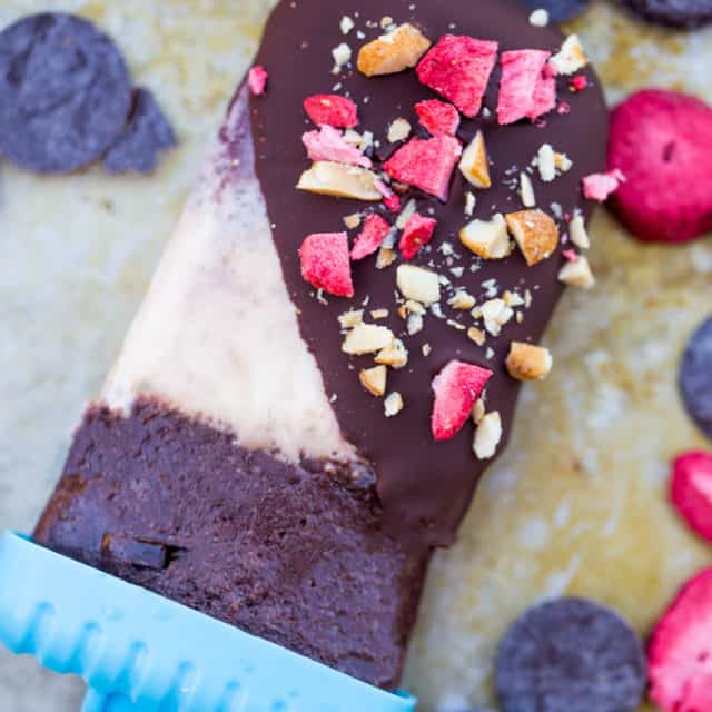 Banana Split Popsicles made with sorbets, chocolate shell and crushed peanuts. A healthy dairy-free take on the classic ice cream shoppe dessert!