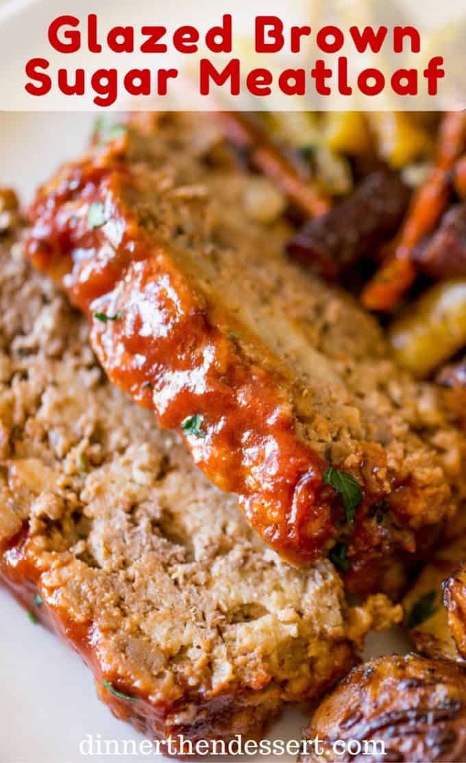 Meatloaf slices on a plate with veggies