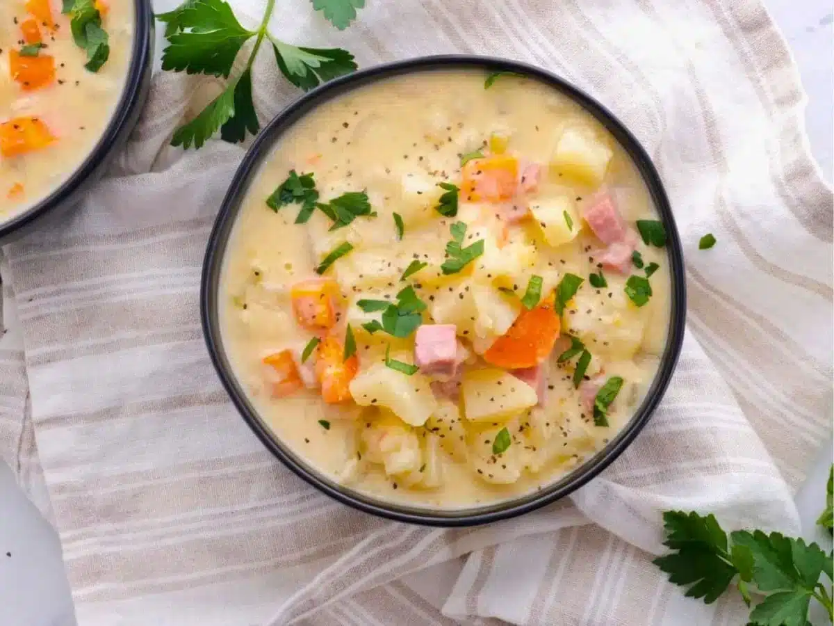 top down view of soup in a bowl on a cloth 
