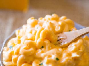 Super Creamy Macaroni and Cheese with no processed cheese in sight, this stovetop version is the perfect homemade creamy macaroni and cheese of your dreams and a perfect holiday side dish!