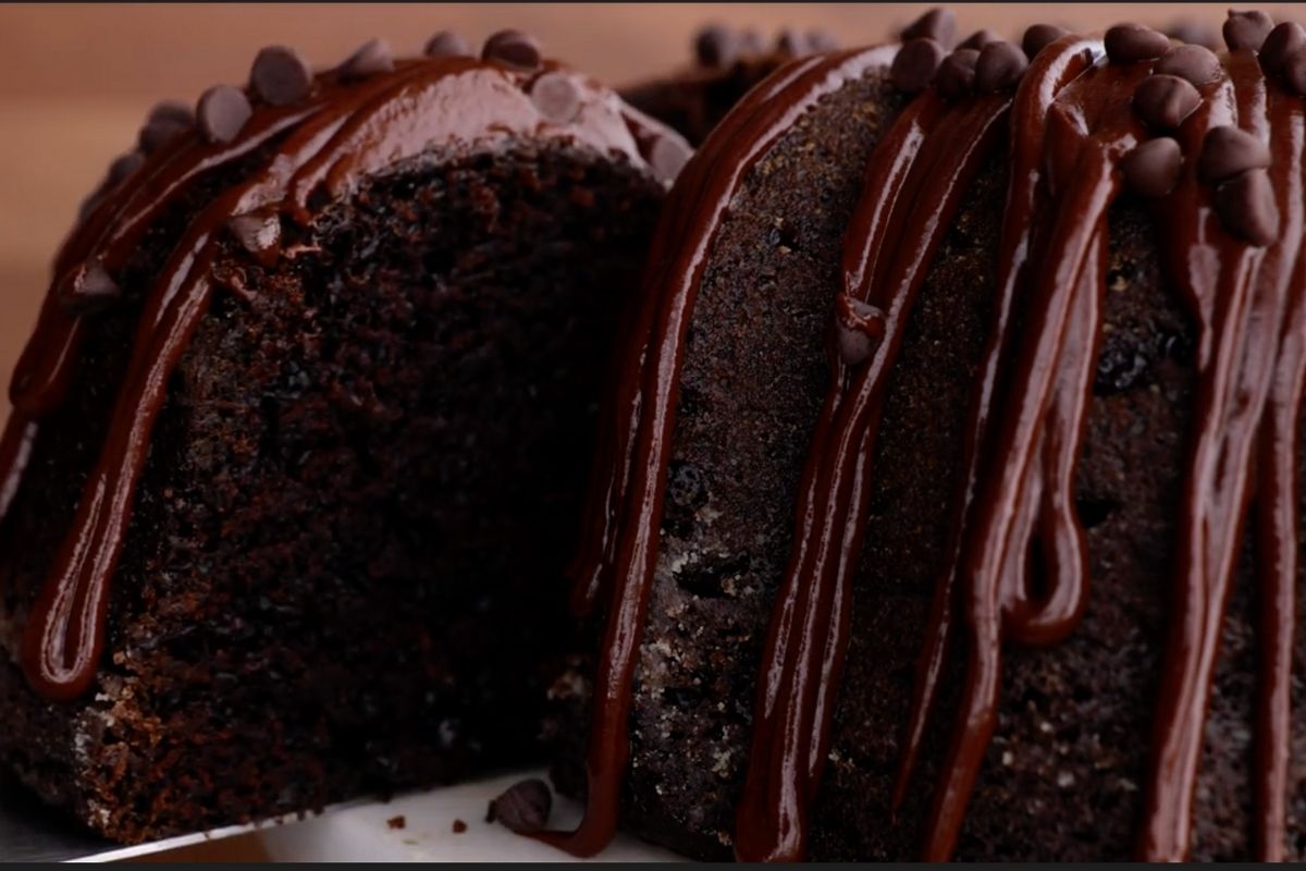 Triple Chocolate Bundt Cake slice being cut