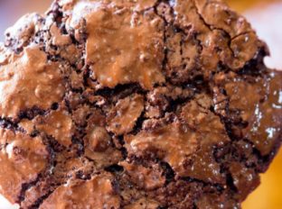Flourless Chocolate Chewy Cookies are crispy and chewy with a fudgy center that take just a few minutes to make and taste like they came from a bakery!