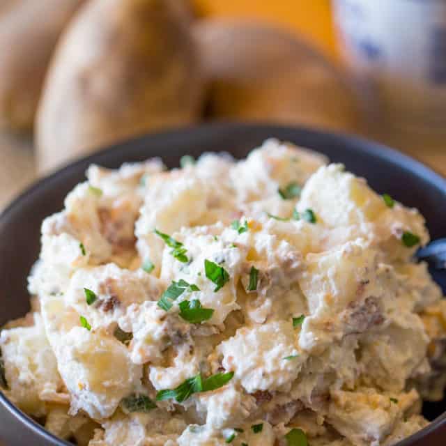 Loaded Baked Potato Salad is cheesy, creamy and ready in just minutes. It makes the perfect side dish to your holiday meal or potluck!