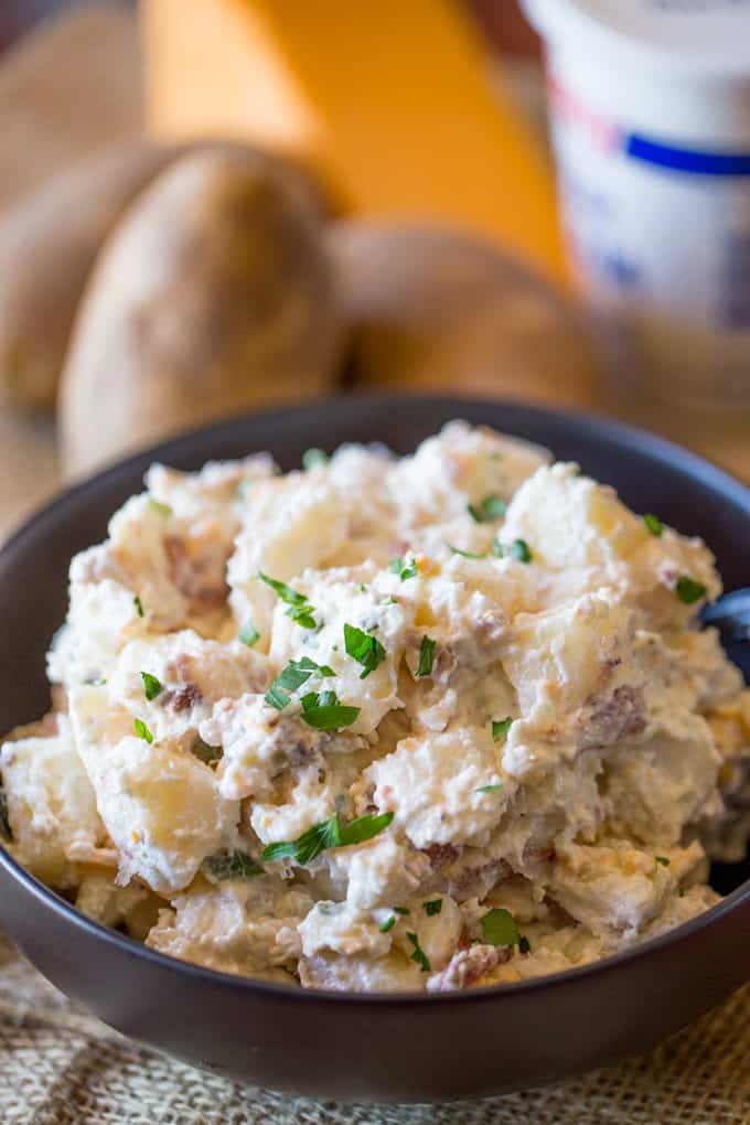 Loaded Baked Potato Salad is cheesy, creamy and ready in just minutes. It makes the perfect side dish to your holiday meal or potluck!