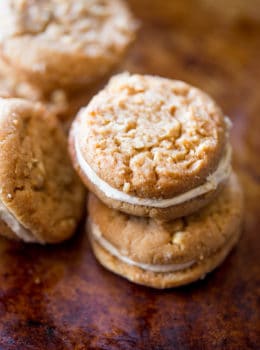 Peanut Butter Do-si-dos Cookie Sandwiches are a Girl Scouts favorite made with peanut butter and oatmeal are sandwiched together with a fluffy soft peanut butter buttercream filling.