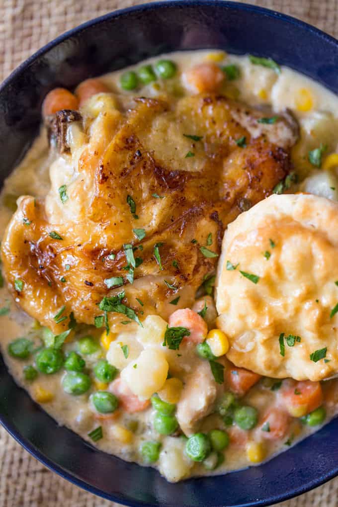 Slow Cooker Crispy Chicken Pot Pie with crispy chicken thighs and all your favorite pot pie vegetables cooked together to make a thick and creamy side dish to the chicken.