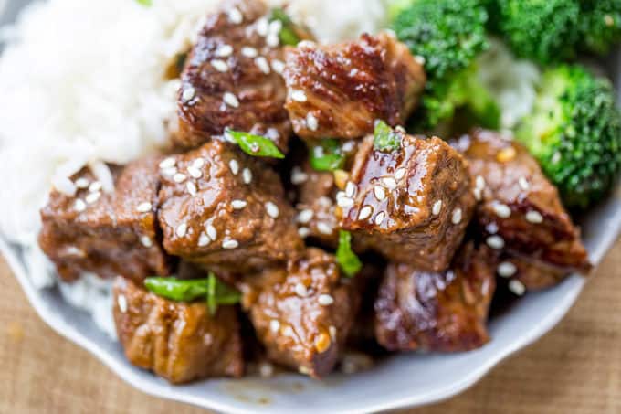 Slow Cooker Korean Beef with just 10 minutes of prep makes the easiest weeknight meal with so much flavor from the garlic, ginger and sesame oil.