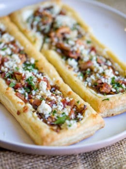 Bacon Blue Cheese Caramelized Onion Tart with just five ingredients total, it is the perfect easy appetizer for a party that can be prepped and frozen ahead of time so you can just bake right before your party!