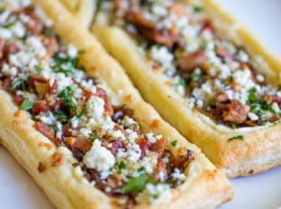 Bacon Blue Cheese Caramelized Onion Tart with just five ingredients total, it is the perfect easy appetizer for a party that can be prepped and frozen ahead of time so you can just bake right before your party!