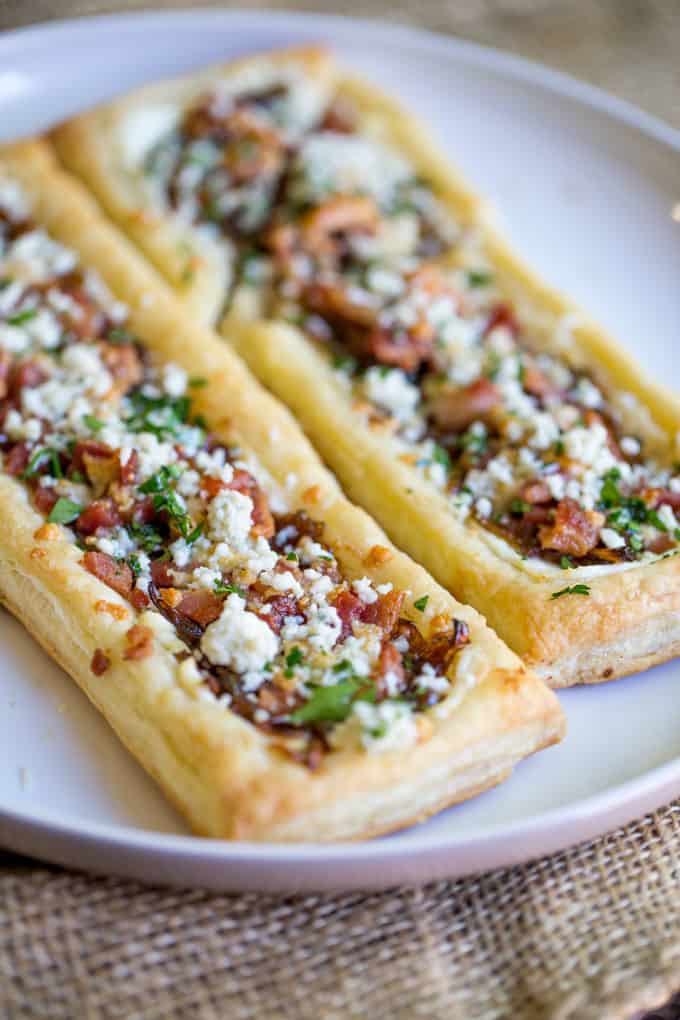 Bacon Blue Cheese Caramelized Onion Tart with just five ingredients total, it is the perfect easy appetizer for a party that can be prepped and frozen ahead of time so you can just bake right before your party!