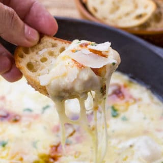 Baked Fontina Cheese Dip inspired by Ina Garten with garlic and thyme amped up with the addition of fresh mozzarella and Parmesan is the perfect appetizer.