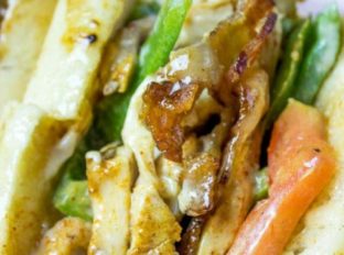 Chicken Madness Philly Sub Sandwiches are a Georgetown University tradition and an amazing alternative to your classic Philly cheesesteak sandwich with peppers, onions, bacon, garlic and hot peppers.