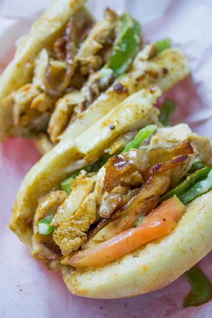 Chicken Madness Philly Sub Sandwiches are a Georgetown University tradition and an amazing alternative to your classic Philly cheesesteak sandwich with peppers, onions, bacon, garlic and hot peppers.