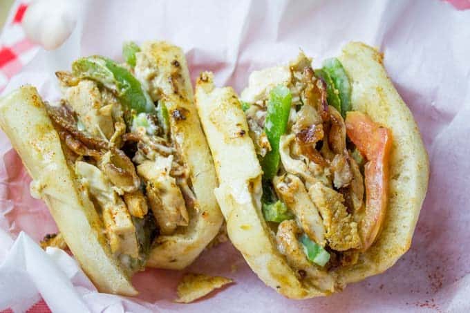 Chicken Madness Philly Sub Sandwiches are a Georgetown University tradition and an amazing alternative to your classic Philly cheesesteak sandwich with peppers, onions, bacon, garlic and hot peppers.