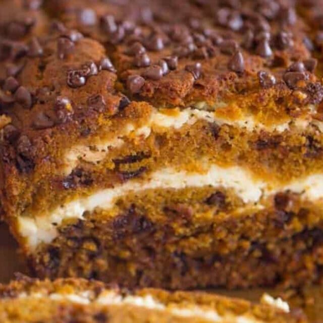 Pumpkin loaf sliced to show cream cheese center