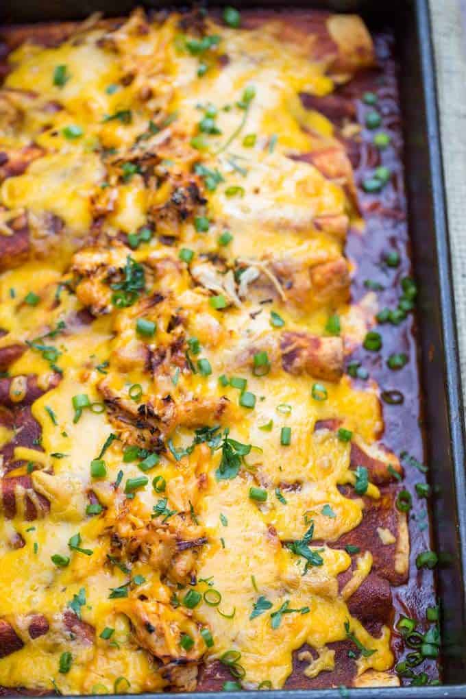 Homemade Chicken Enchiladas topped with green onions