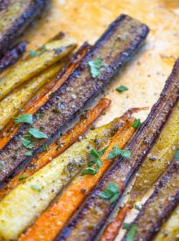Garlic Butter Roasted Carrots with a touch of canola oil, cracked black pepper and Kosher salt makes the perfect side dish for a weeknight meal or a holiday crowd.