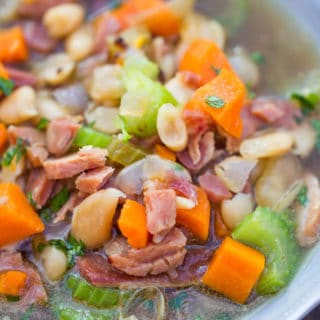 Slow Cooker Ham and White Bean Soup is the perfect recipe after your holiday ham when you want a cozy warm soup to help you recover from holiday cooking!