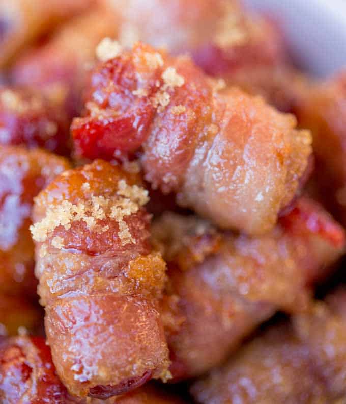 Bacon Brown Sugar Smokies are the quintessential party food that everyone fights over even though they're so easy to make! Just three ingredients plus I have five flavor add-in options for you!