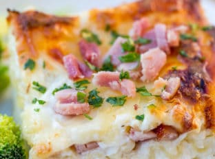 Chicken Cordon Bleu Lasagna made with Ham, Chicken, Swiss and Mozzarella cheeses is the perfect comforting meal to make with your leftover holiday hams!