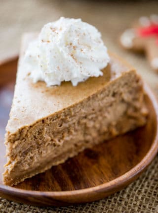 Gingerbread Cheesecake is creamy and tangy and full of warm holiday flavors that is the perfect ending to your favorite holiday meal.